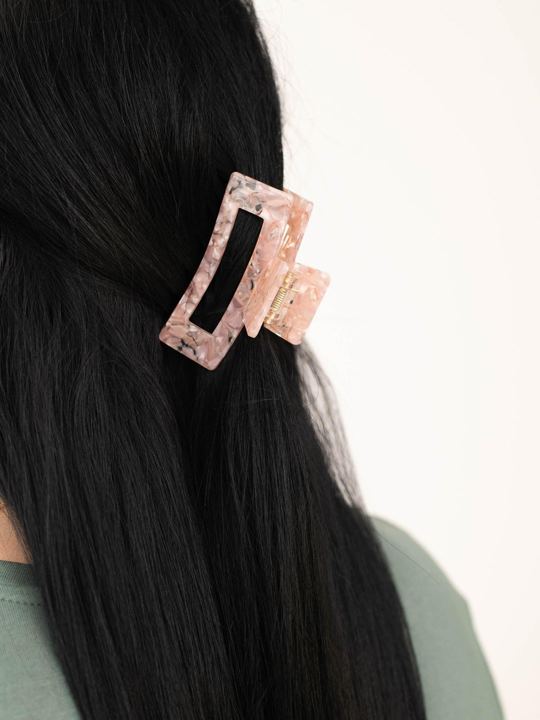 Close-up of Basic (small) claw clip in Rose Quartz, designed for thin and fine hair.