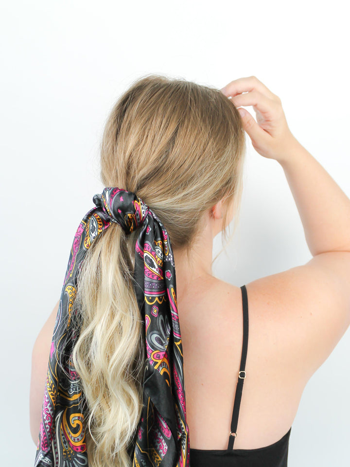 Black Retro Paisley Hair Scarf in blonde hair around ponytail