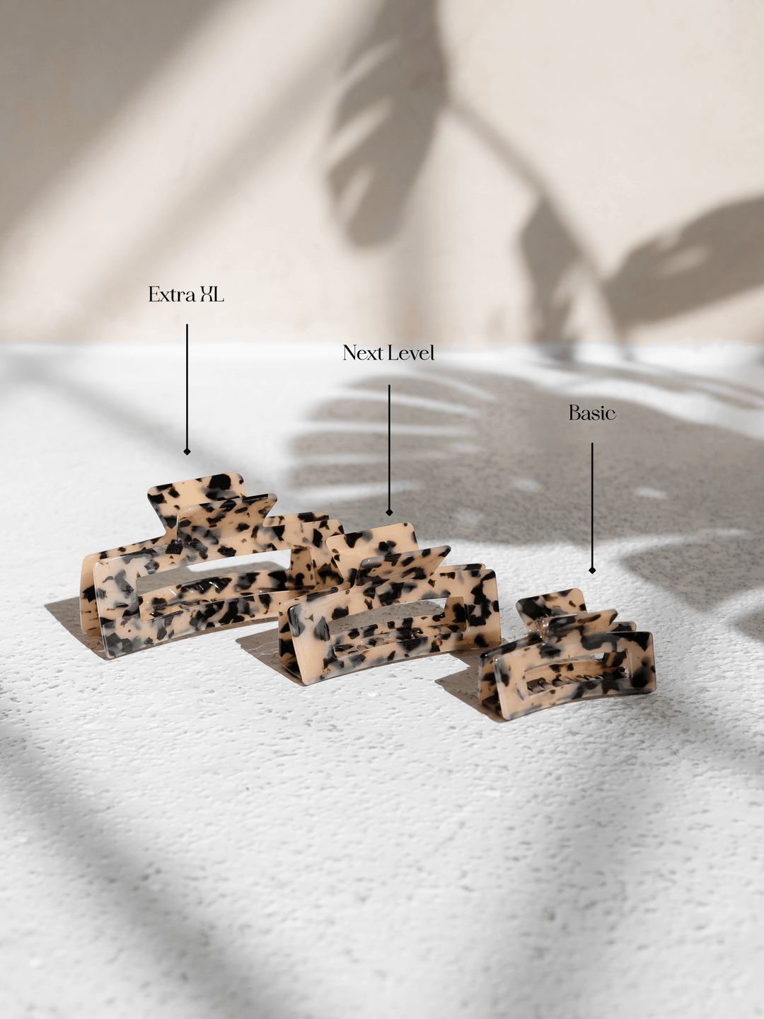 Comparison of Extra XL, Next Level, and Basic claw clips in light tortoise shell – designed for all hair types.