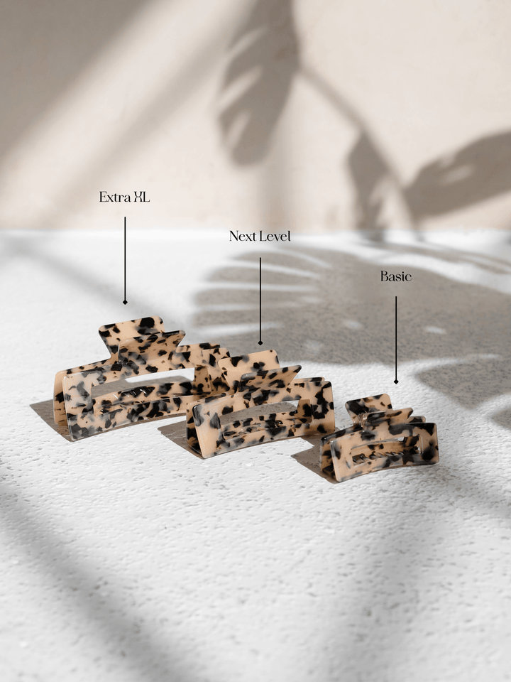 Comparison of Extra XL, Next Level, and Basic claw clips in light tortoise shell – designed for all hair types.